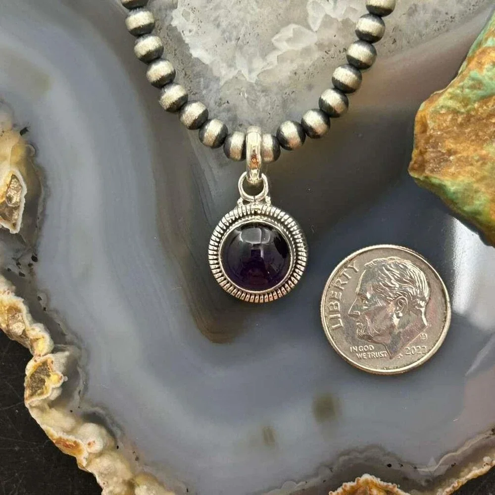 Sterling Southwestern Style Round Amethyst Decorated Charm/Pendant For Women